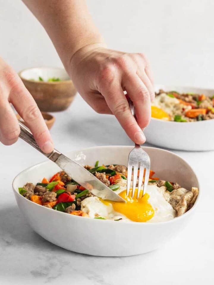 sweet potato breakfast bowl being cut into