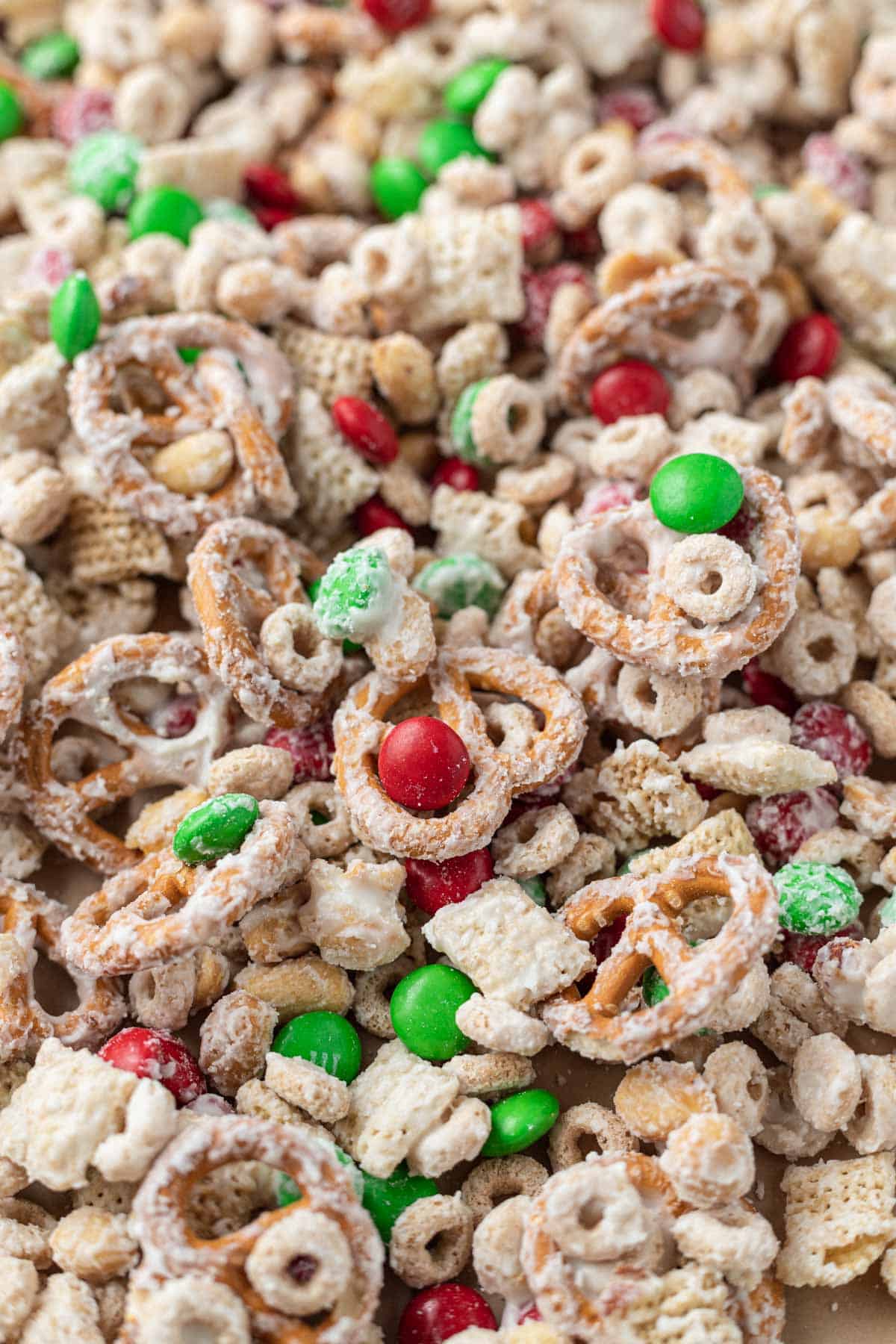close up of christmas chex mix with red and green m&ms