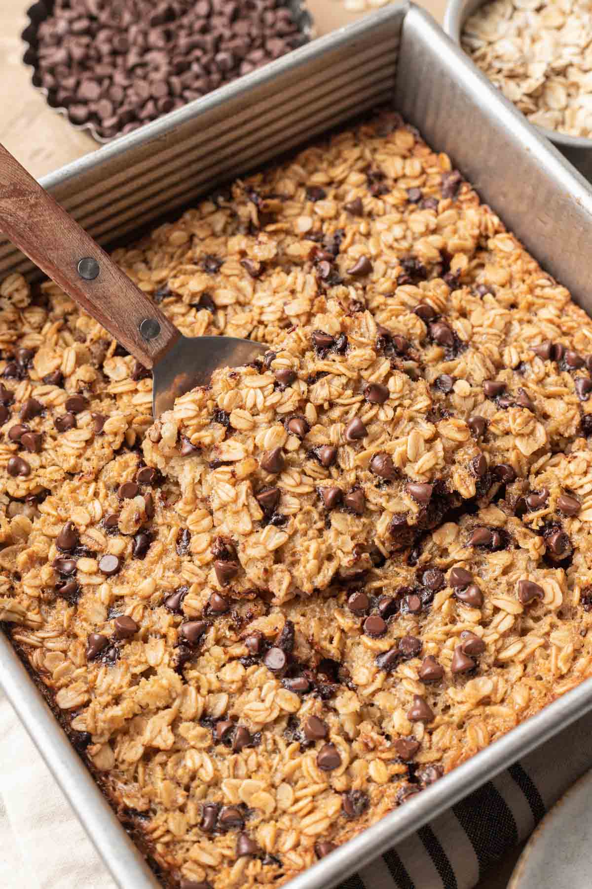 Tin baking pan filled with chocolate chip baked oatmeal that just came out of the oven.