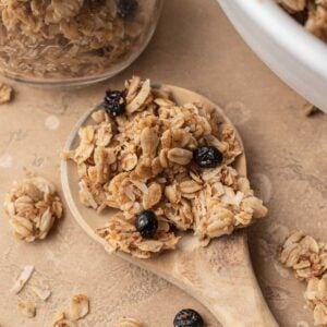 Wooden spoonful of homemade granola.
