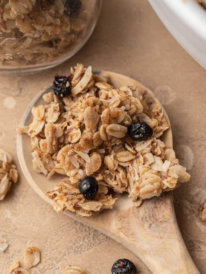 Wooden spoonful of homemade granola.