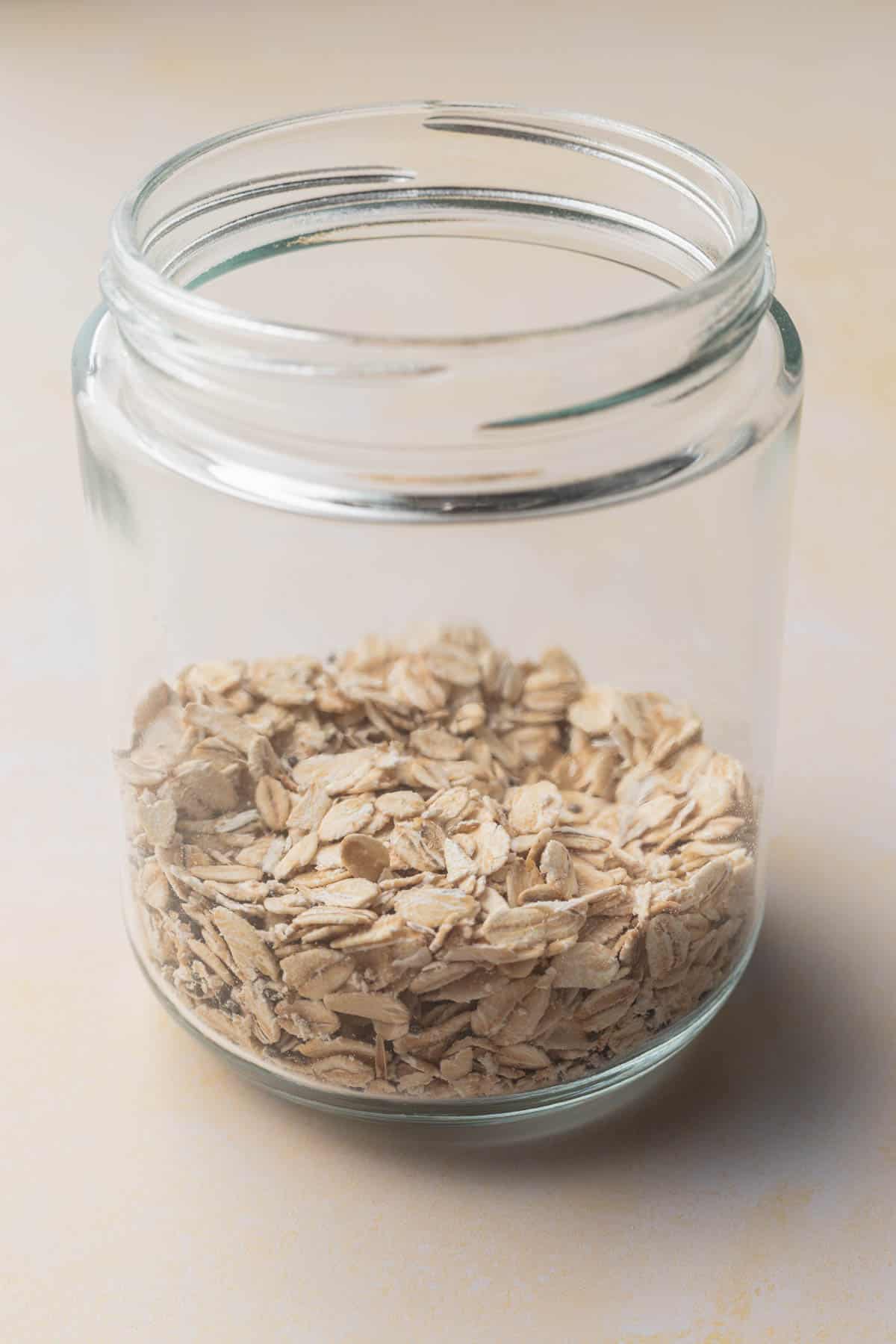 oats and chia seeds mixed together in a glass jar.