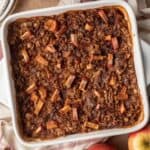 overhead view of apple baked oats in a white square baking dish.